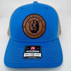 Richardson 112 trucker hat with custom laser engraved leather patch featuring I Flick More Bean Than a Coffee Shop logo, Cobalt Blue and Grey color scheme