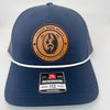 Richardson 112 trucker hat with custom laser engraved leather patch featuring I Flick More Bean Than a Coffee Shop logo, Navy with White Rope color scheme