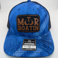 Richardson 112PFP trucker hat with custom laser engraved leather patch featuring Motor Boatin logo, Realtree Fishing and Navy color scheme